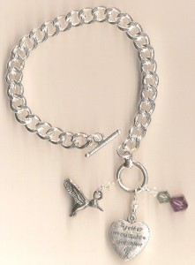 Silver bracelet with hummingbird